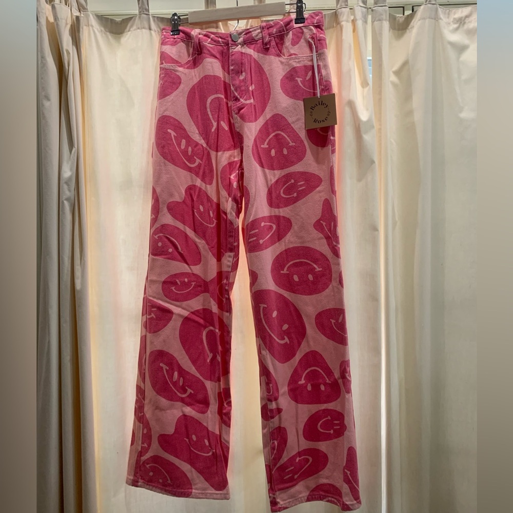 Women’s pink smiley face jeans